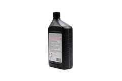 ACDelco 1L bottle beside measuring cup showing size and service convenience