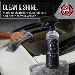 Adam's Polishes being wiped on a car panel showing safe cleaning and high gloss