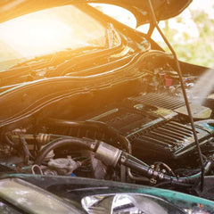 Akfix A115 used on an engine bay showing before and after cleaner results
