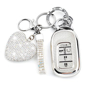 Amazauto key fob cover front view showing silver trim and visible buttons, stylish protection