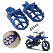 AnXin front view of blue foot pegs showing solid platform and improved control