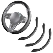 Aotoyou front view installed on steering wheel showing sleek black finish and improved grip
