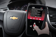 ATEQ VT37 held in hand to show compact size and portability for mobile technicians