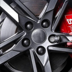 Close-up of Generic Audi center cap detail highlighting durable polypropylene benefit