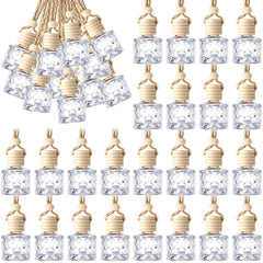 BBTO front view of hanging glass diffuser pack showing bottles and ropes, practical storage
