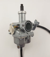 BH-Motor carburetor beside ruler for scale to confirm correct size and compatibility