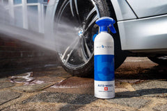 Bilt Hamber Auto-Wheel being rinsed from wheel in driveway, effective finish-safe cleaning