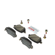 Bosch BC1779 front view of rear pads showing fit and OE-style shims for quieter stops
