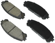 Bosch BE1324H front axle brake pad set in box showing included hardware and towel