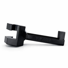Bow Buddy headrest hanger holding a helmet keeps cab organized