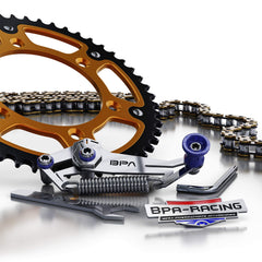 BPA-RACING tool mounted on a motorcycle swingarm illustrating fast adjustment and cleaner maintenance