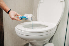Camco close-up of single 4 oz bottle highlighting easy dosing