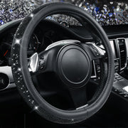 CAR PASS front view of black diamond steering wheel cover, shows full sparkle and shape