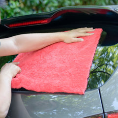 CARCAREZ towel drying a car panel, removing water efficiently without scratching paint