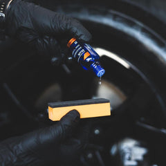 CARPRO applying coating to plastic trim for restored finish