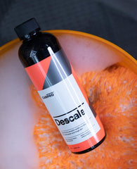 CARPRO Descale bottle close-up highlighting cap and concentrated formula