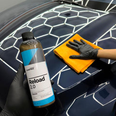 CARPRO close-up of paint finish demonstrating high gloss and reflectivity
