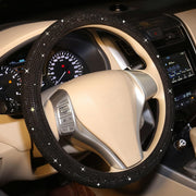 Carwales front view of black rhinestone steering cover showing elegant design and sparkle benefit