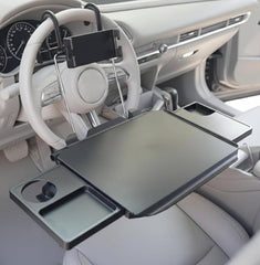 CASASARA front view showing tray mounted on steering wheel for stable work