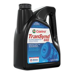 Pouring Castrol TranSynd 668 into a transmission dipstick tube demonstrating proper use