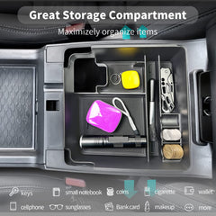 CDEFG organizer lifted out to show two-tier storage and easy removal benefit