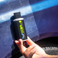 Chemical Guys V34 16 oz bottle held in hand showing scale and user-friendly size