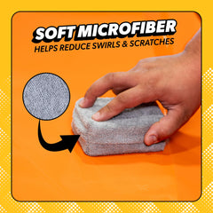 Chemical Guys pad in hand showing ergonomic grip for controlled application