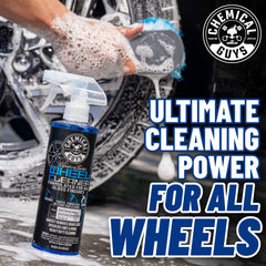 Chemical Guys spraying cleaner on wheel to loosen brake dust and grime
