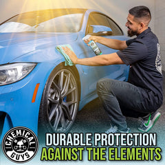 Chemical Guys being used on a sedan door post-spray showing safe dirt removal and immediate gloss