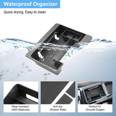 Coleya top view holding phone keys and sunglasses for quick reachability