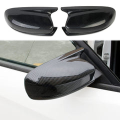 Crosselec front view of mirror cover showing carbon-fiber pattern and sleek finish
