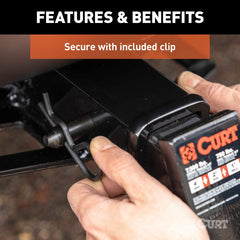 CURT hitch pin with included clip inserted in retainer hole for added security