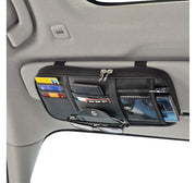 Da by front view of visor organizer showing pockets and zippers for quick access