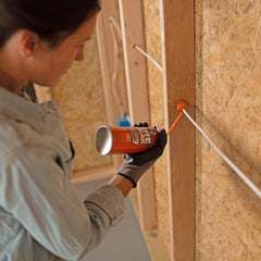 DAP FireBreak applied to HVAC penetration showing brand blocking air and flame paths