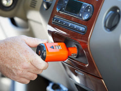 Dead Down Wind Dead Zone Ozone2Go installed in car outlet illustrating continuous cabin odor reduction