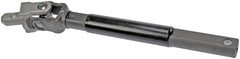 Dorman steering shaft next to ruler showing exact length for fitment