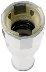 Dorman connector held in hand for size comparison showing correct 5/8 x 5/8 fitment