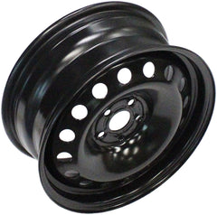 Dorman wheel beside tire for scale showing sizing clarity and installation confidence