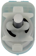 Dorman stoplight switch beside ruler to show exact size and fit