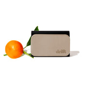 drift front packaging showing grove scent and metal clip, highlights clean ingredients