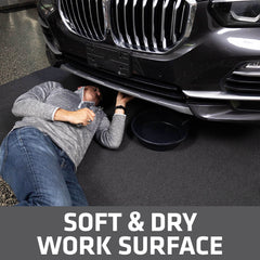 Drymate placed under a car in garage protecting concrete from leaks