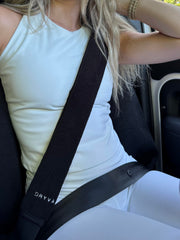 Dryva front view of both 20-inch seat belt covers showing full-coverage benefit