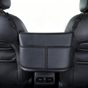 DYPZMNS front view between seats showing organized storage and easy access
