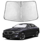 EcoNour front view sunshade fitted on BMW 5 Series windshield showing full coverage