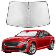 EcoNour front view installed on Cadillac CT5 showing full windshield coverage and sun protection