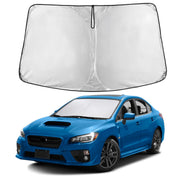 EcoNour front view installed in Subaru Impreza WRX showing full windshield coverage and sun protection