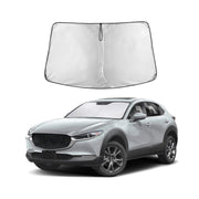 EcoNour front view on Mazda CX‑30 windshield showing full coverage and sun protection