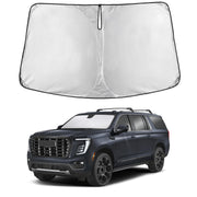 EcoNour front view on GMC Yukon XL showing full windshield coverage and sun protection
