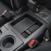 EDBETOS front view of console tray showing neat storage benefit