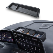 EDBETOS front view installed behind center screen adds hidden storage
